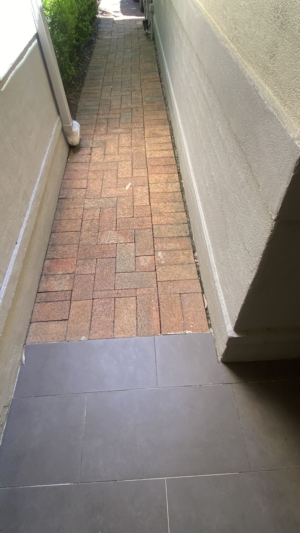 Ground falling toward the house, holding water against the footings, found during a pre-purchase building and pest inspection in Castle Hill