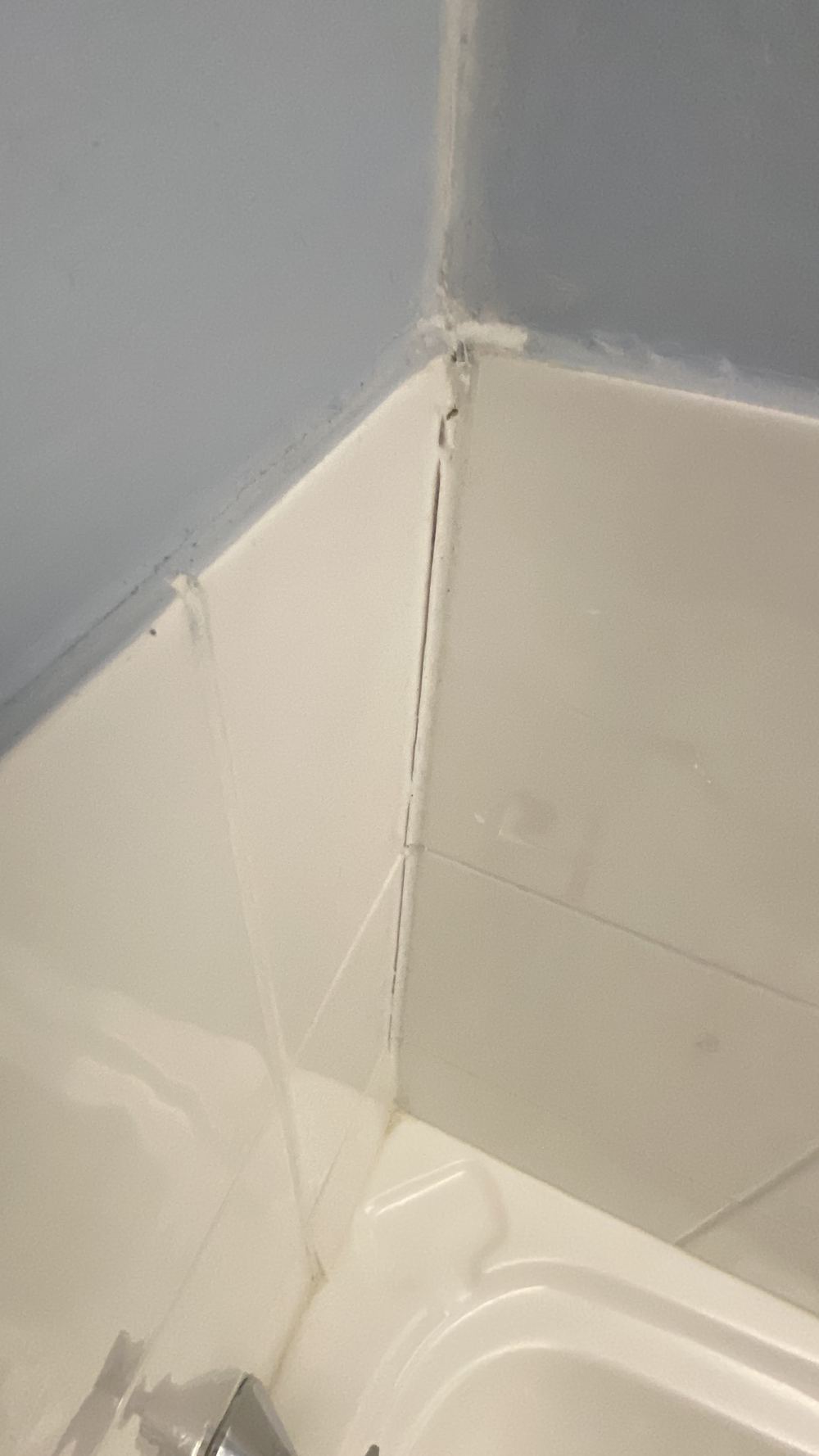Old sealant missing in sections, letting moisture into the wall, found during a pre-purchase building and pest inspection in Castle Hill